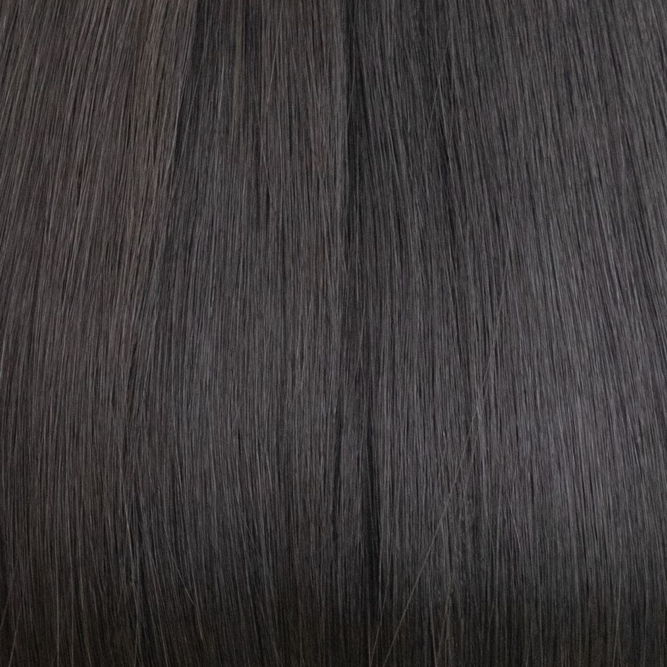 Close-up of dark brown hair texture