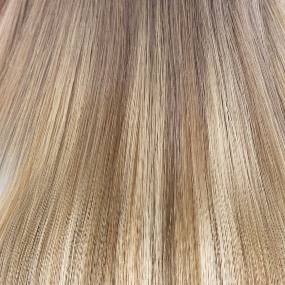 Close-up of brown and blonde hair extensions