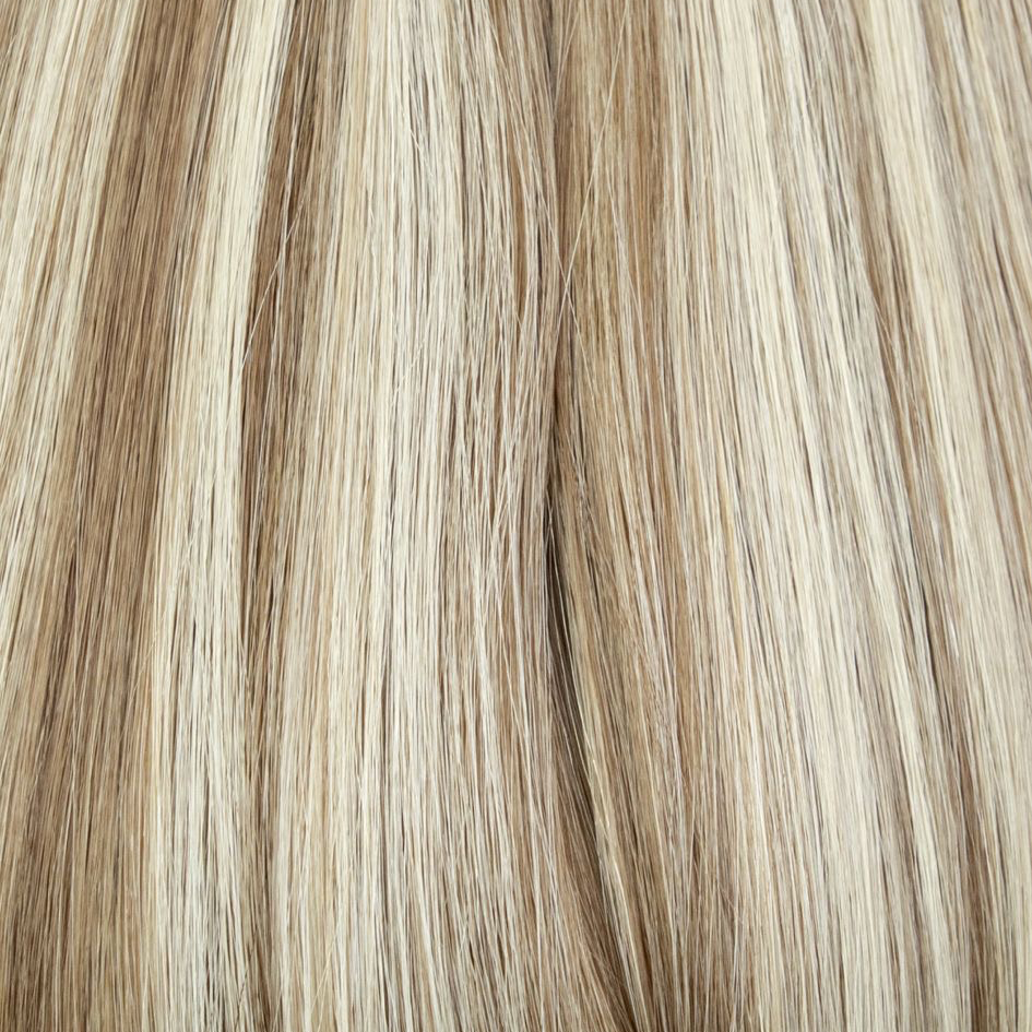 Close-up of brown and blonde hair strands